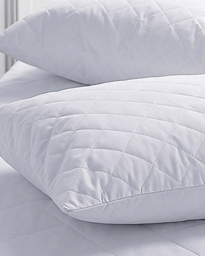 Three pillow protectors stacked – 17x23, 18x27, 20x30