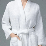 100% cotton waffle bathrobe displayed folded with belt