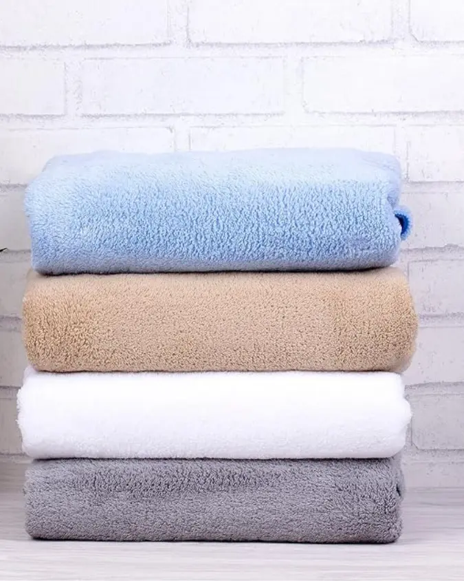Luxury cotton bath towel in spa bathroom
