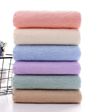 White 650 GSM hotel premium bath towel neatly folded